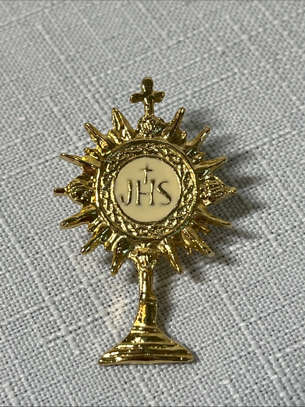Vintage Gold Religious Sunburst Pin with Ivory Center
JHS
Like New